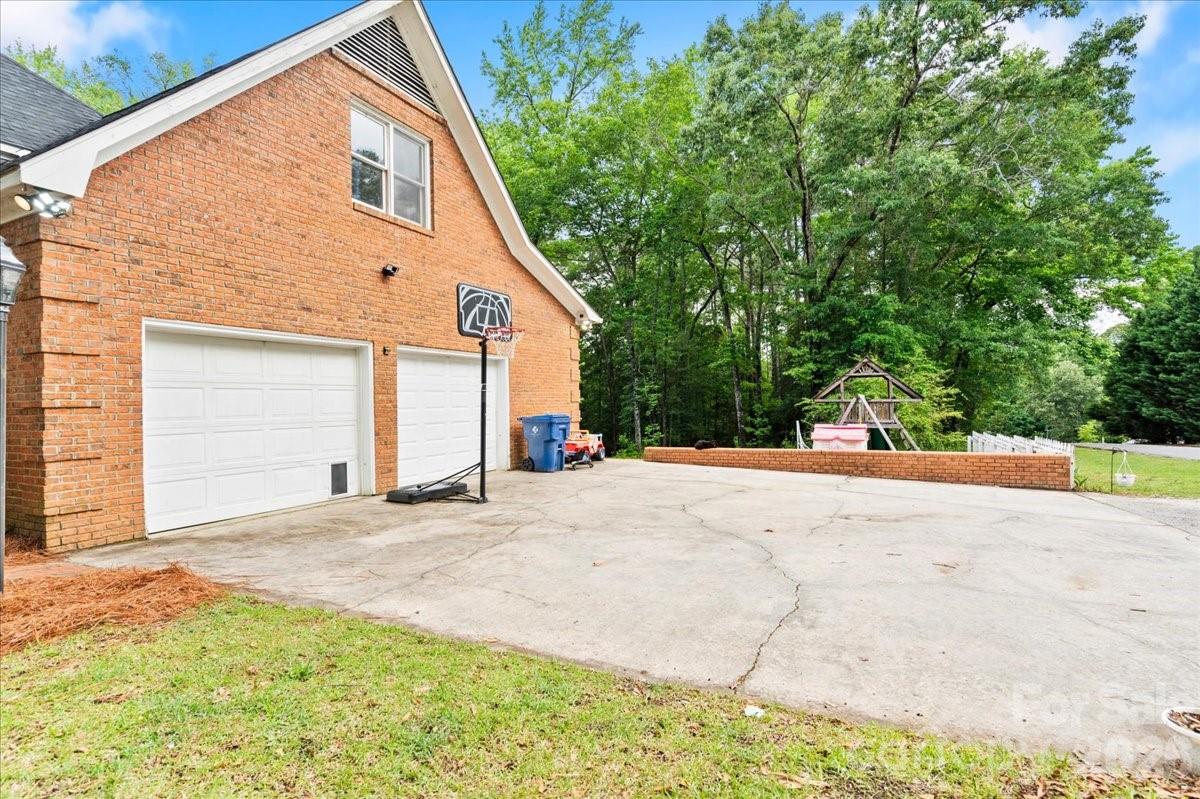 209 Fairway Road Cheraw, SC 29520 - Photo 33 of 48 a view of a house with a outdoor space