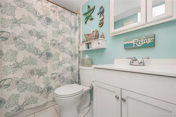 a room with gym equipment and mirror