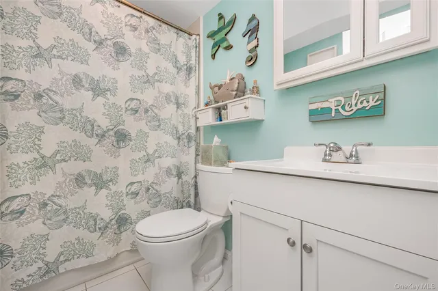 a room with gym equipment and mirror