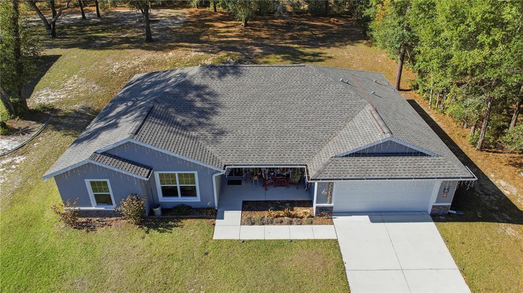 9239 Southwest 197th Circle Dunnellon, FL 34432 - Photo 2 of 57 a view of house with outdoor space