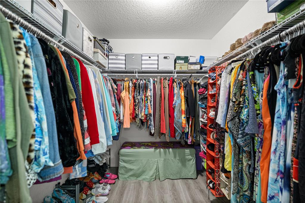9239 Southwest 197th Circle Dunnellon, FL 34432 - Photo 32 of 57 a view of walk in closet with clothes
