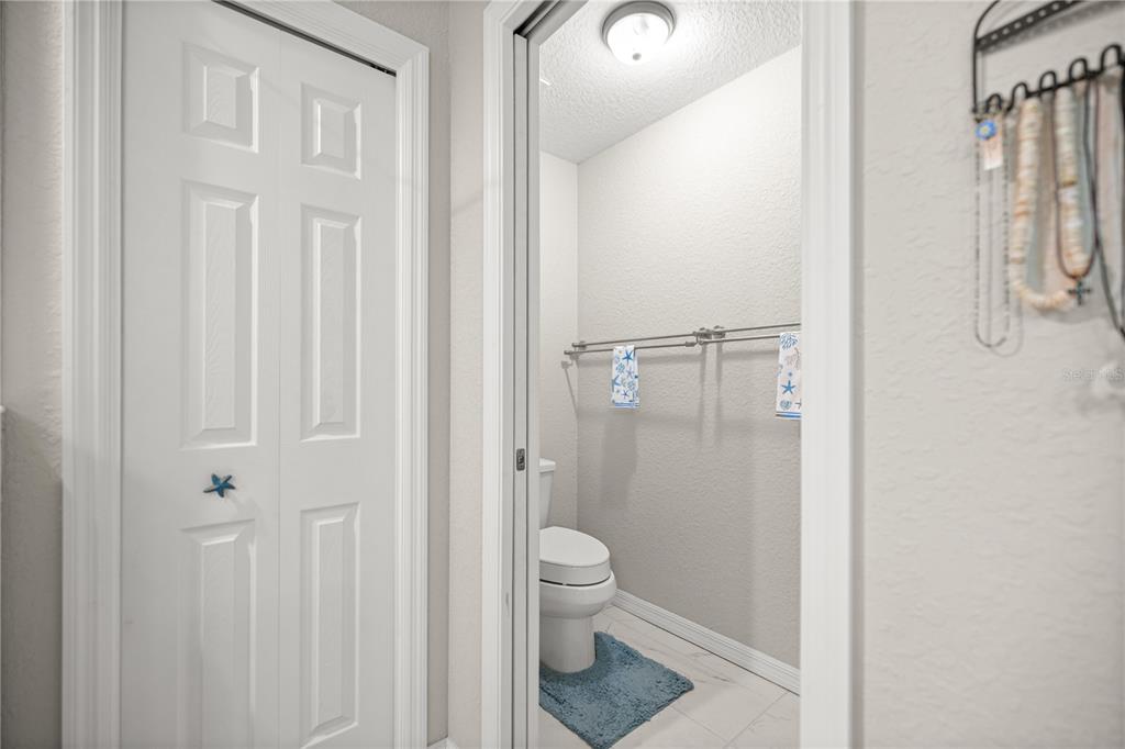 9239 Southwest 197th Circle Dunnellon, FL 34432 - Photo 33 of 57 a bathroom with a granite countertop sink