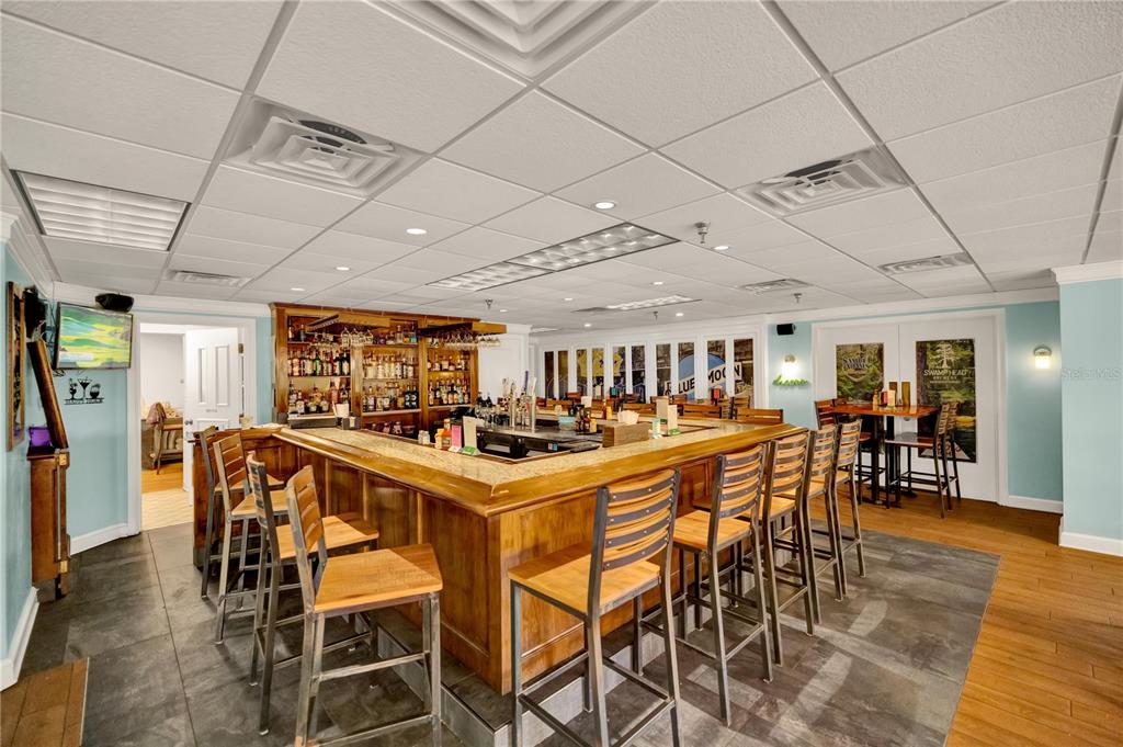 9239 Southwest 197th Circle Dunnellon, FL 34432 - Photo 45 of 57 a view of a dining room with furniture window and wooden floor