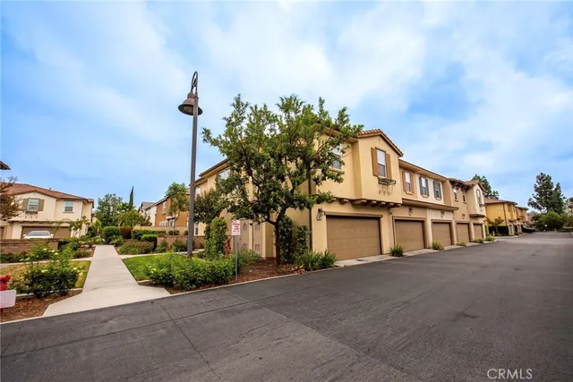 front view of a house with a street