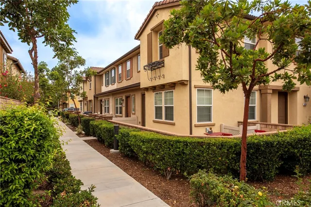 a front view of a multi story residential apartment building