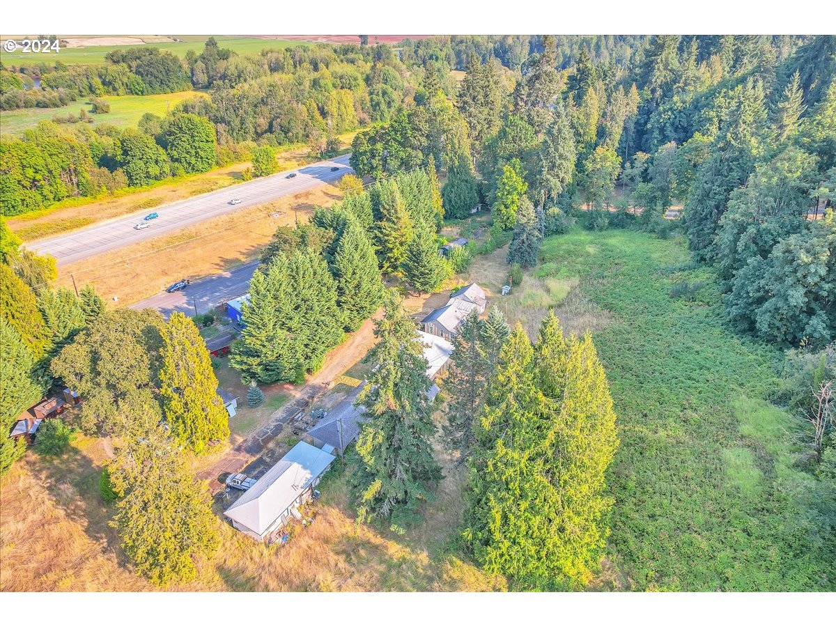26901 Northwest St Helens Road Scappoose, OR 97056 - Photo 11 of 43 a view of a yard with an outdoor space