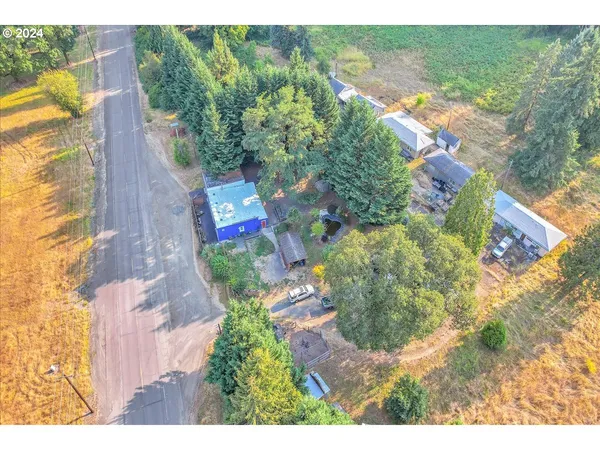 a aerial view of residential houses with outdoor space