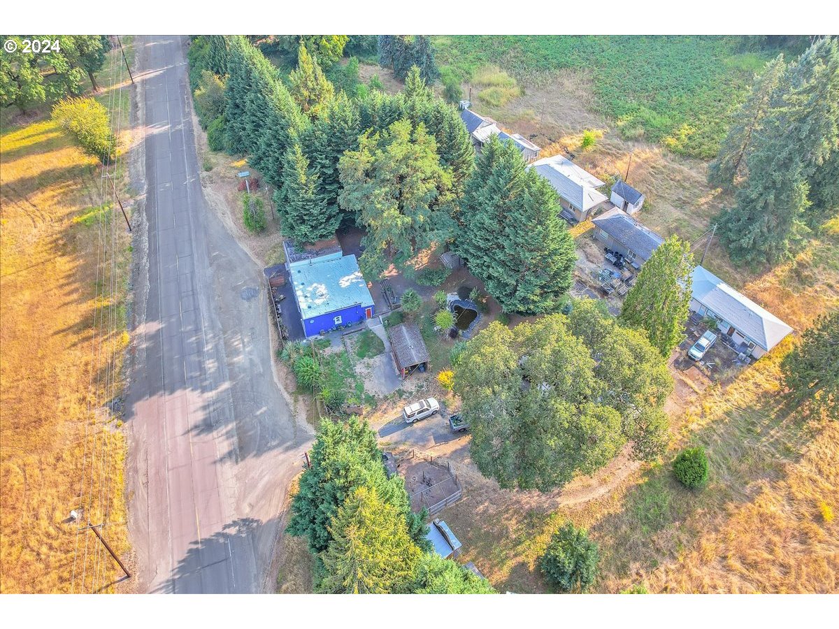 26901 Northwest St Helens Road Scappoose, OR 97056 - Photo 12 of 43 a aerial view of residential houses with outdoor space