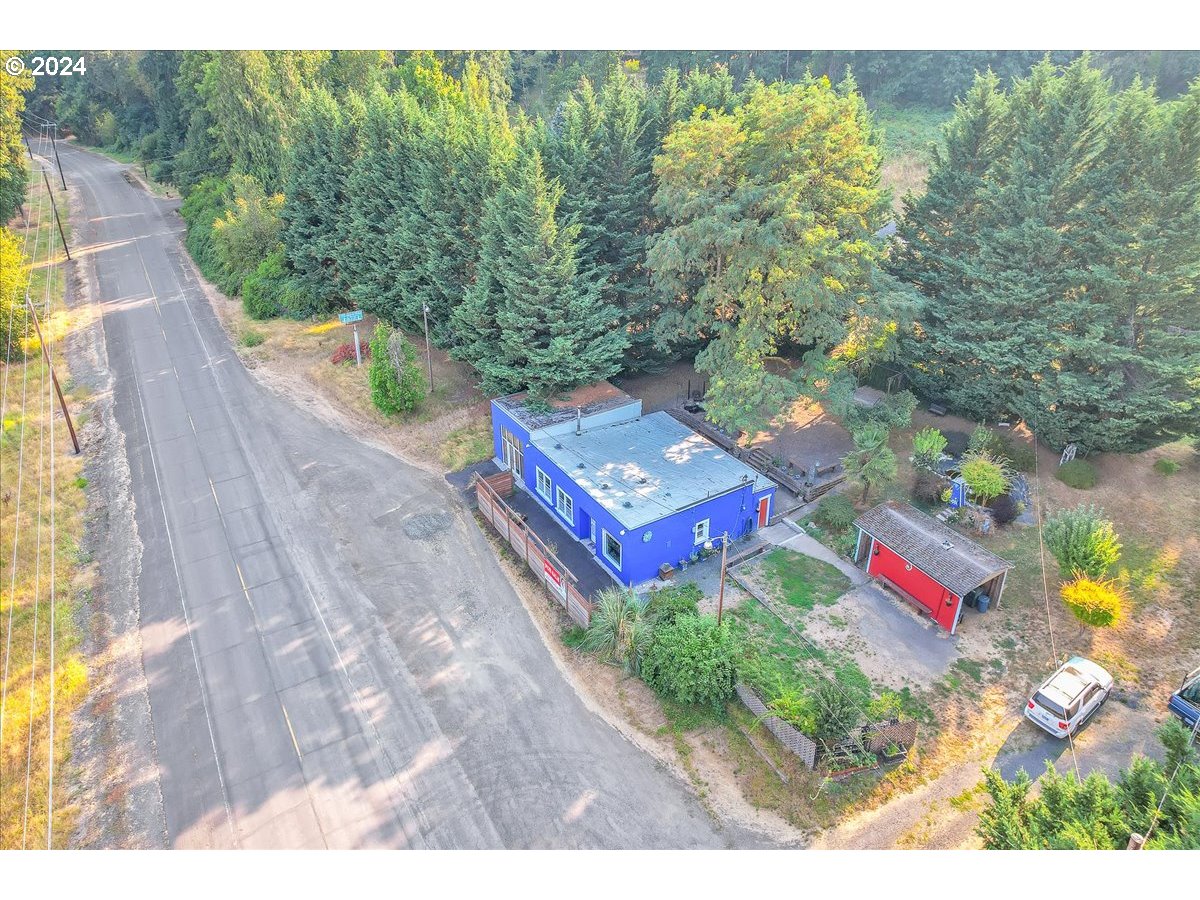 26901 Northwest St Helens Road Scappoose, OR 97056 - Photo 13 of 43 a view of a yard with an outdoor space