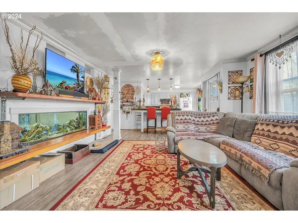 a living room with furniture and a table