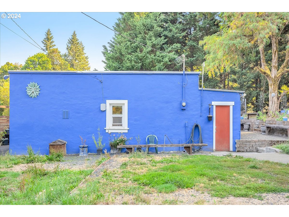 26901 Northwest St Helens Road Scappoose, OR 97056 - Photo 37 of 43 swimming pool with outdoor seating and yard