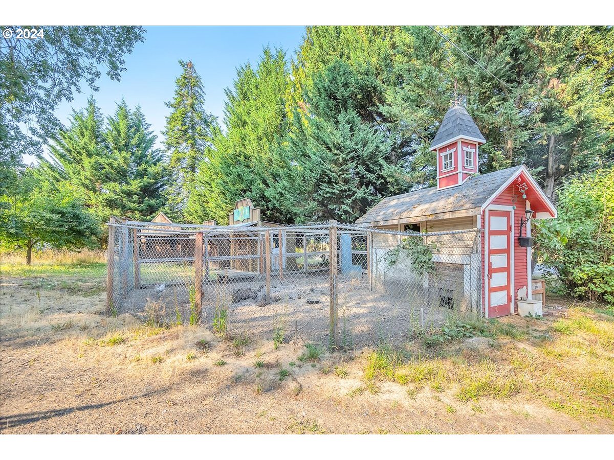 26901 Northwest St Helens Road Scappoose, OR 97056 - Photo 38 of 43 a front view of a house with a yard