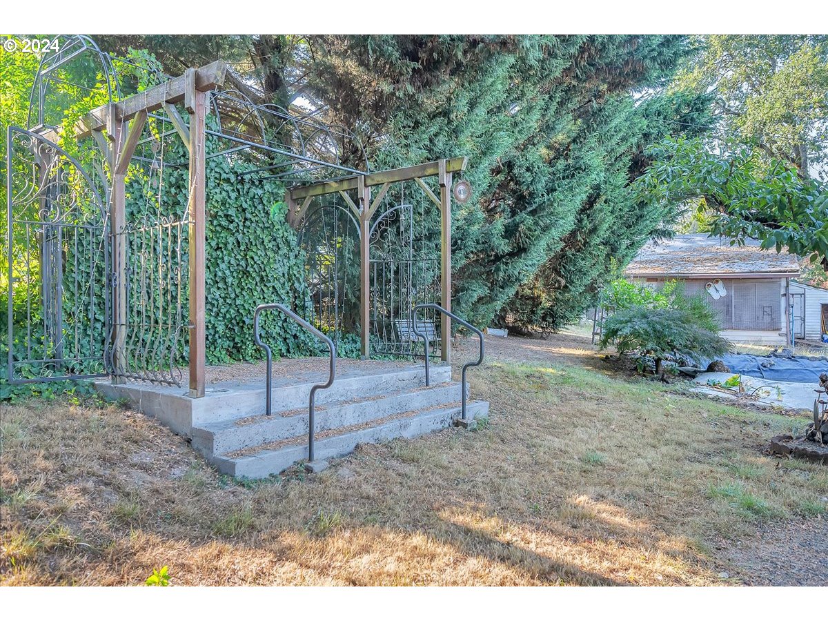 26901 Northwest St Helens Road Scappoose, OR 97056 - Photo 42 of 43 a view of a yard with a tree