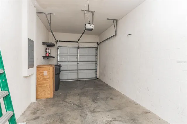 a view of storage and utility room with stairs