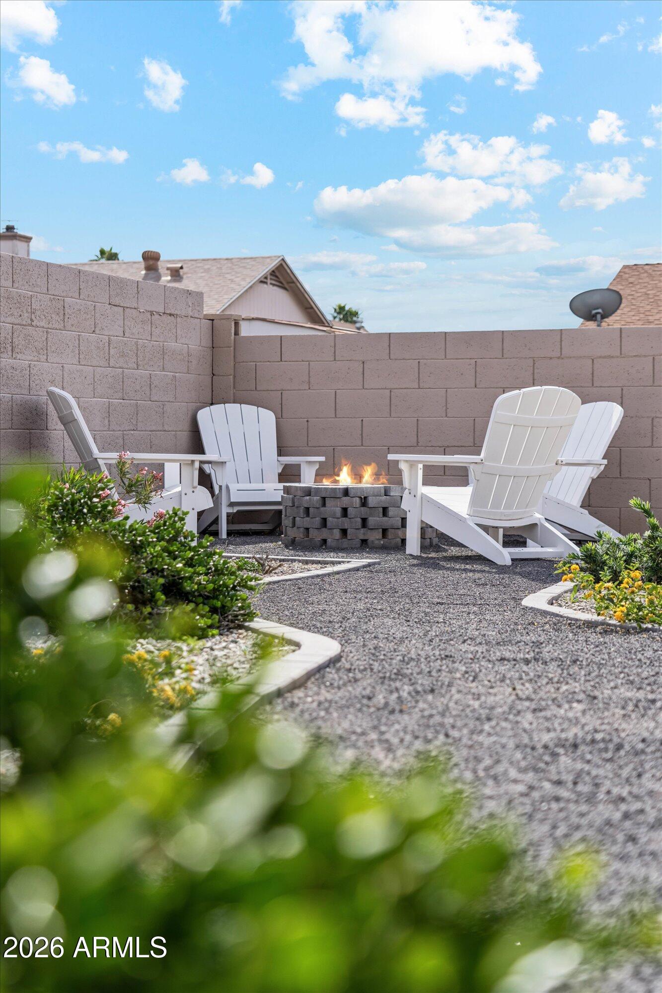 2019 East Butler Street Chandler, AZ 85225 - Photo 5 of 27 a backyard of a house with table and chairs