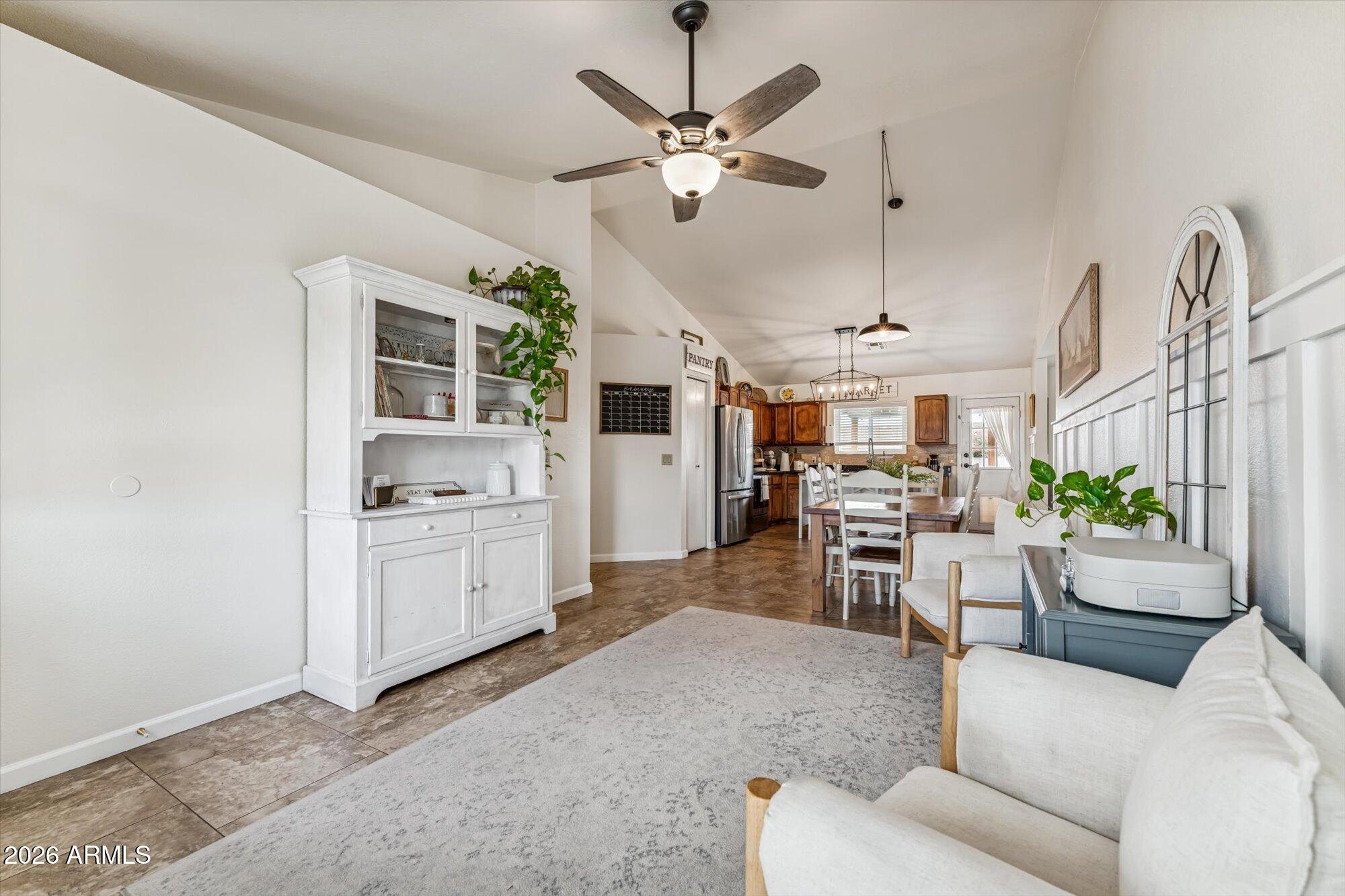 2019 East Butler Street Chandler, AZ 85225 - Photo 9 of 27 a living room with furniture and kitchen view