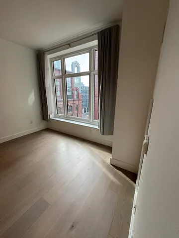 an empty room with windows