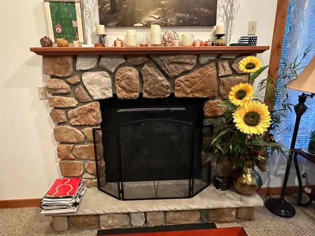 a close view of a fireplace in the room