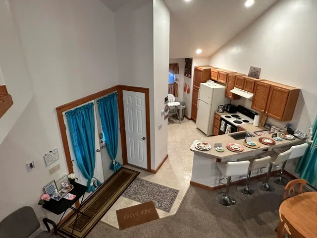 a room with furniture and gym equipment