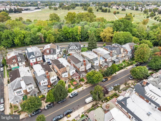 an aerial view of a city with lots of residential buildings
