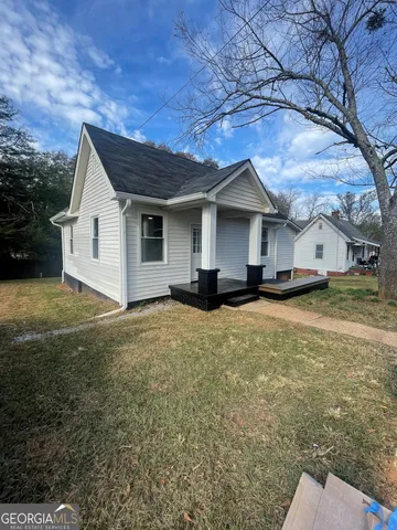 a house view with a garden space