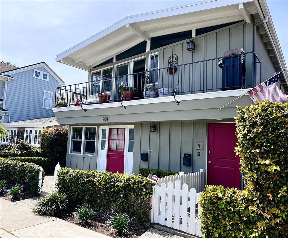 front view of a house with a small yard