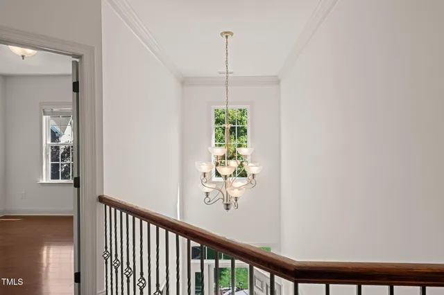 a view of a hallway with windows