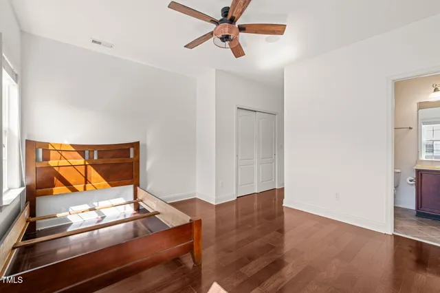 wooden floor in a room with a window