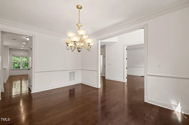 a view of a livingroom with wooden floor