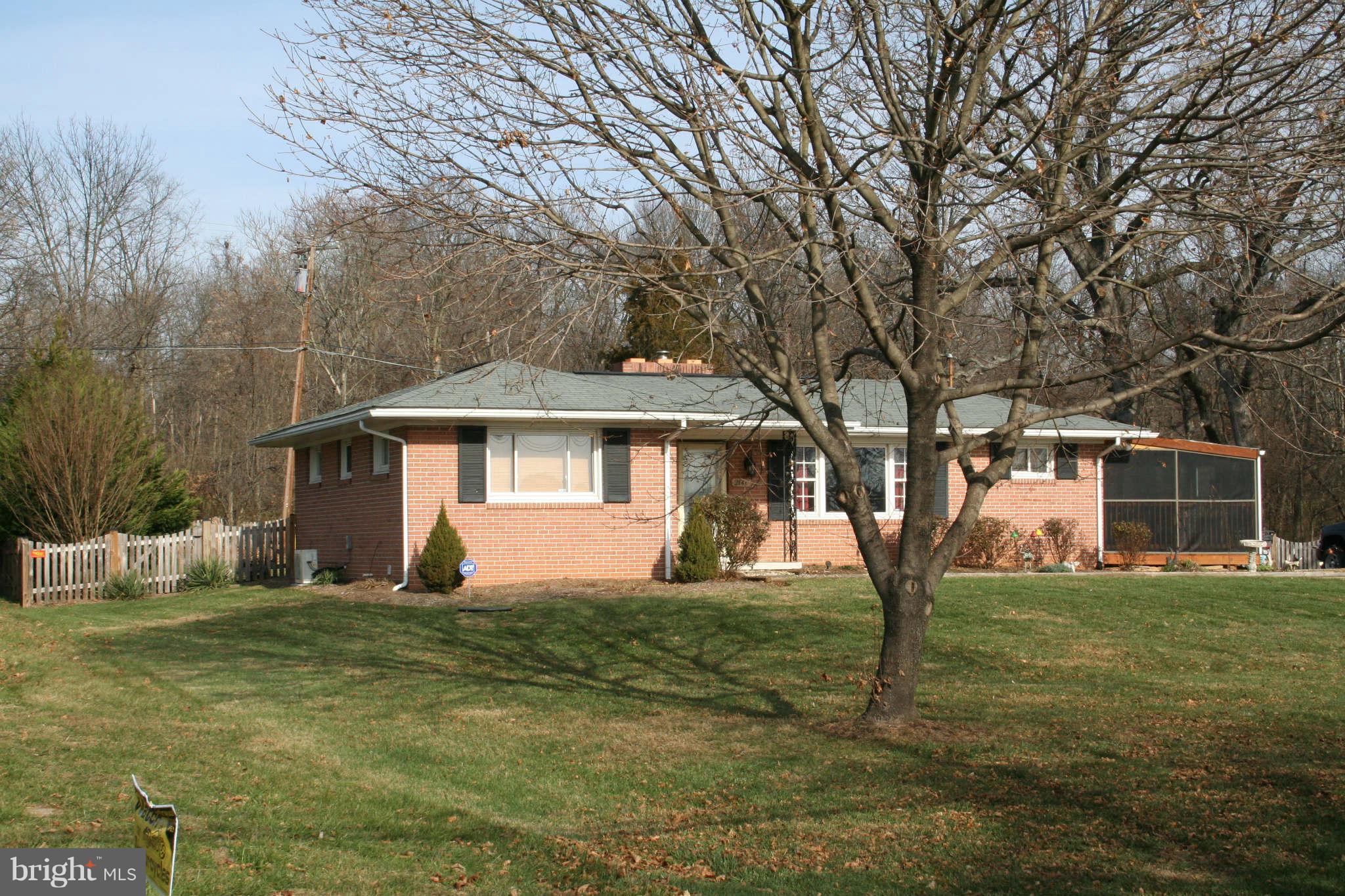 2140 Ballenger Creek Pike Point of Rocks, MD 21777 - Photo 20 of 23 a front view of a house with a yard