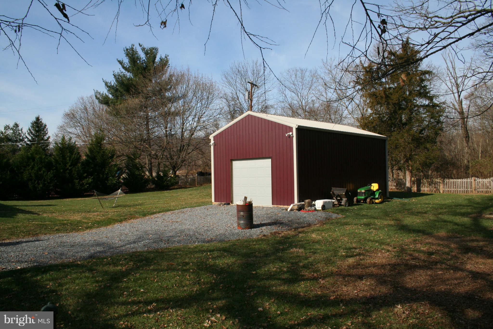 2140 Ballenger Creek Pike Point of Rocks, MD 21777 - Photo 23 of 23 a backyard of a house with lots of green space
