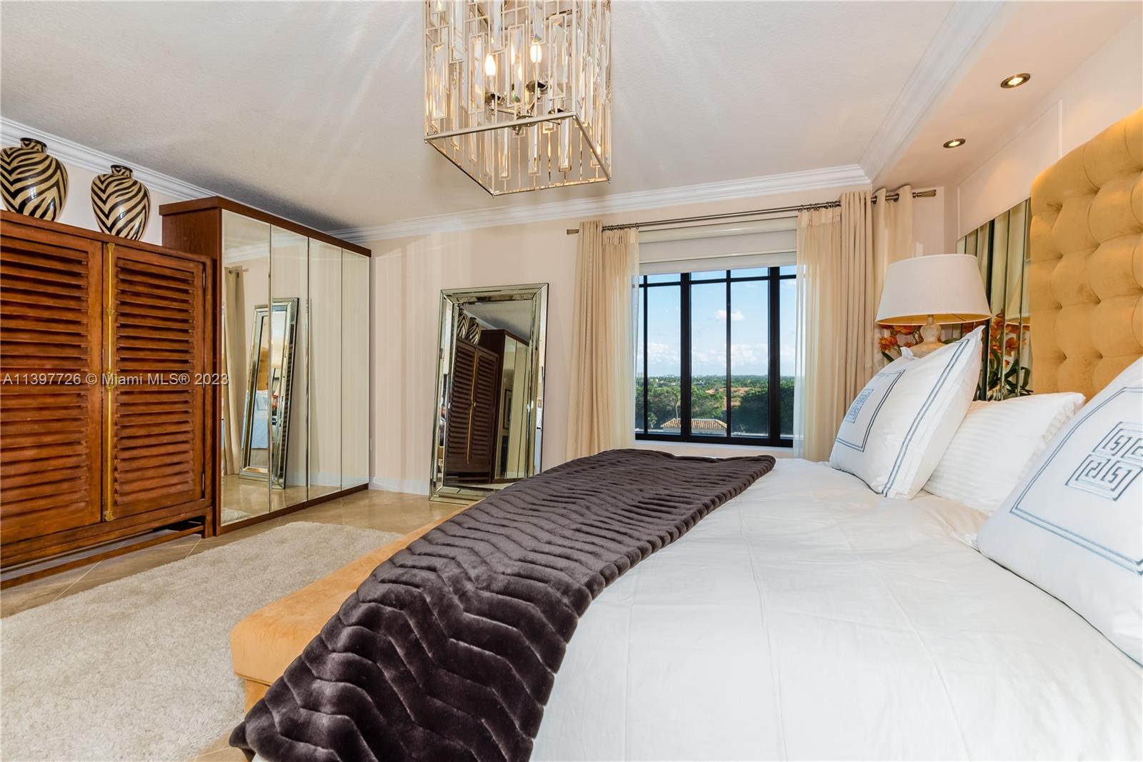 200 East Palmetto Park Road, Unit 700 Boca Raton, FL 33432 - Photo 11 of 31 a bedroom with a bed and a window