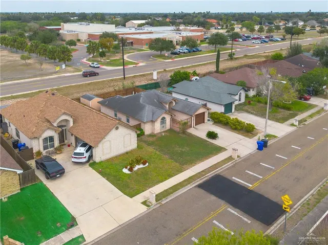 a view of a lake with a house in the background