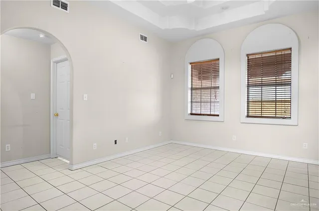 a view of an empty room and window