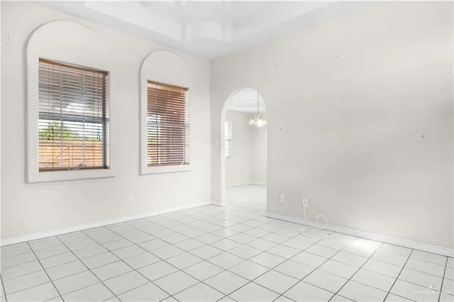 a view of an empty room and window