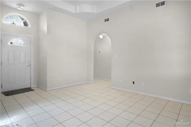 an empty room with white door