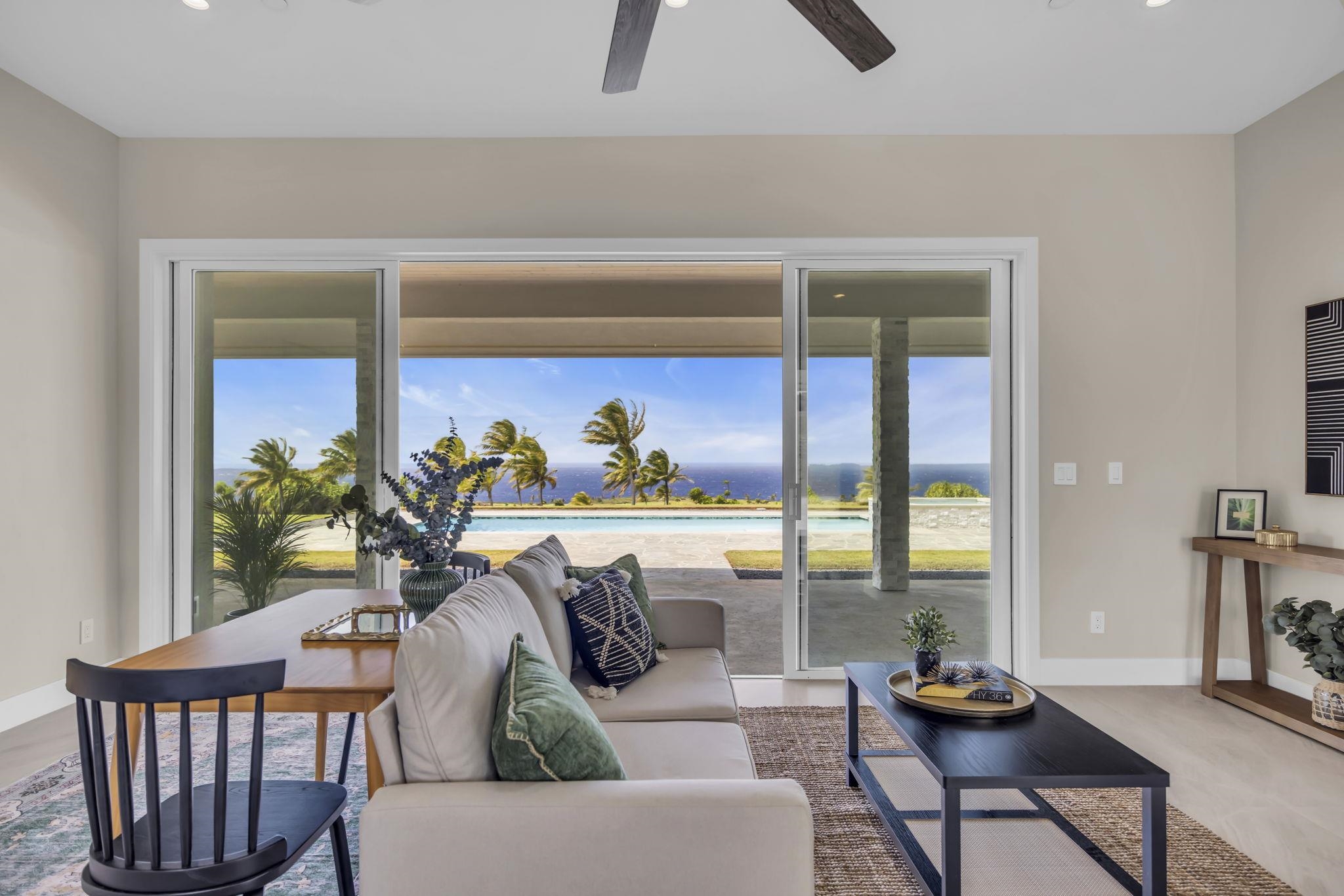 500 Kai Huki Circle, Unit B Haiku, HI 96708 - Photo 14 of 50 a living room with furniture a rug and a window