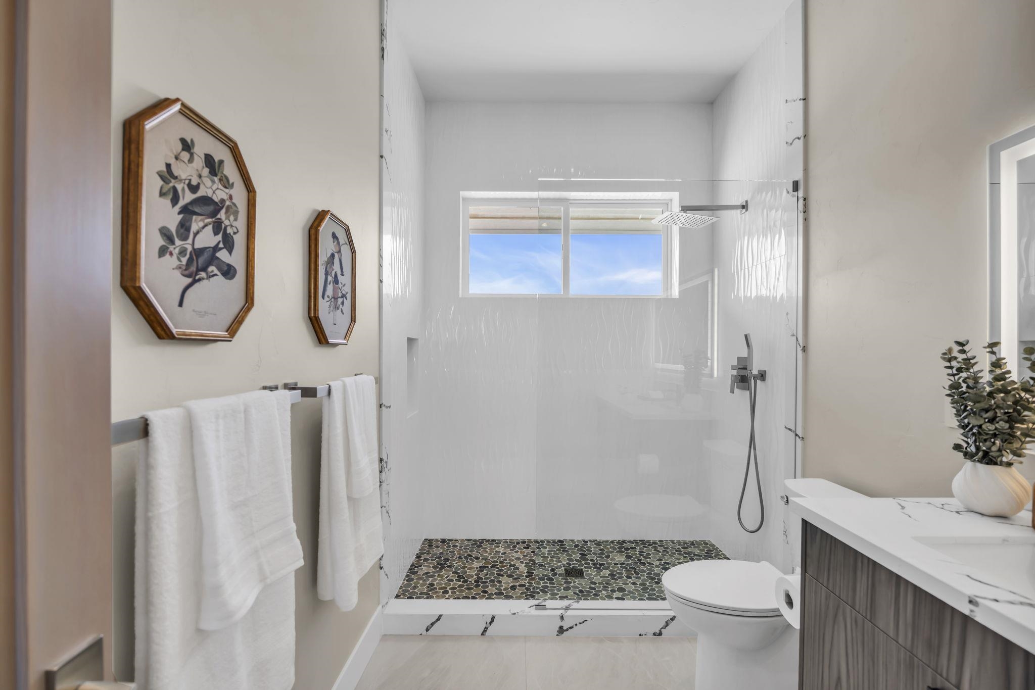 500 Kai Huki Circle, Unit B Haiku, HI 96708 - Photo 24 of 50 a bathroom with a sink toilet and shower