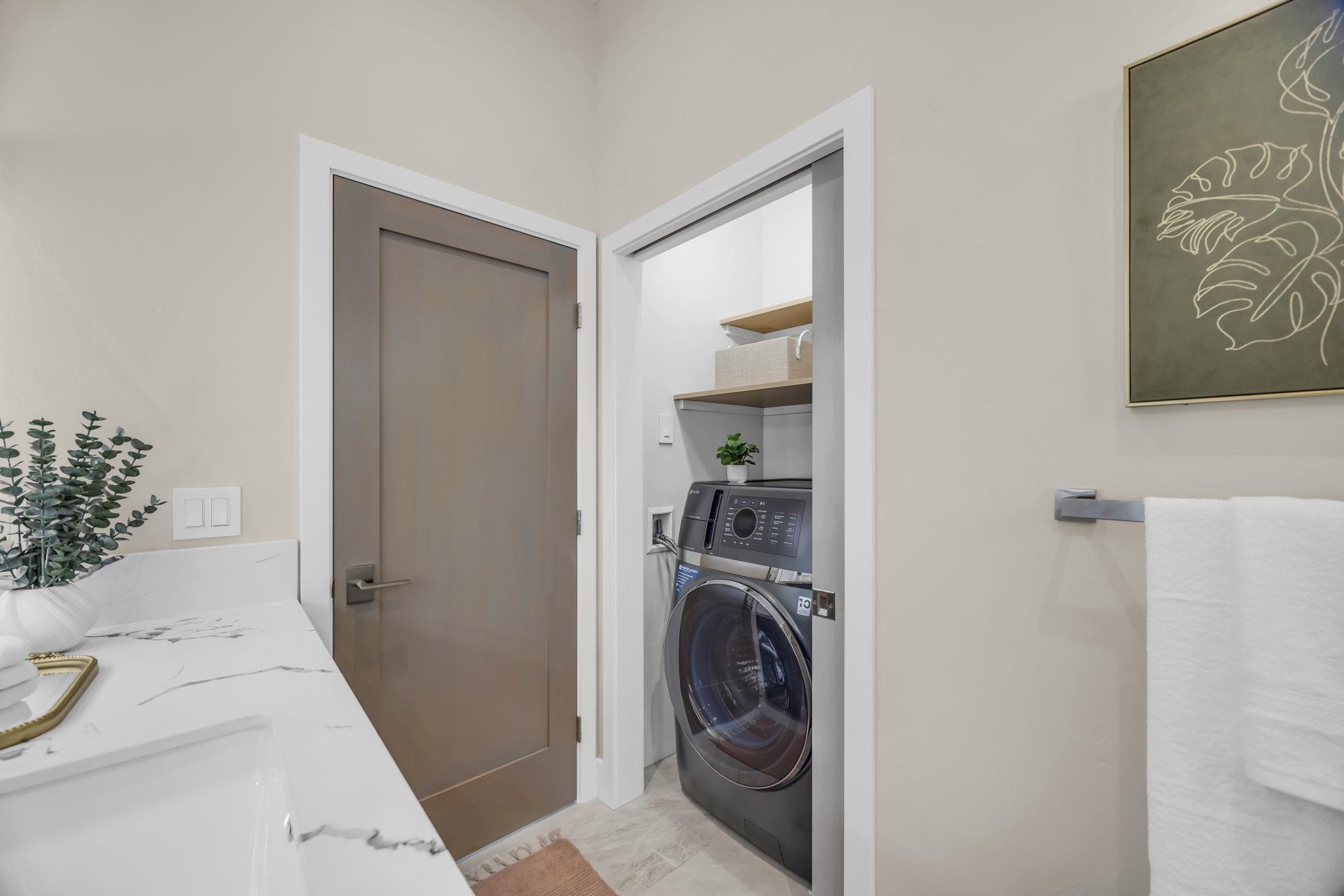 500 Kai Huki Circle, Unit B Haiku, HI 96708 - Photo 25 of 50 a utility room with dryer and washer