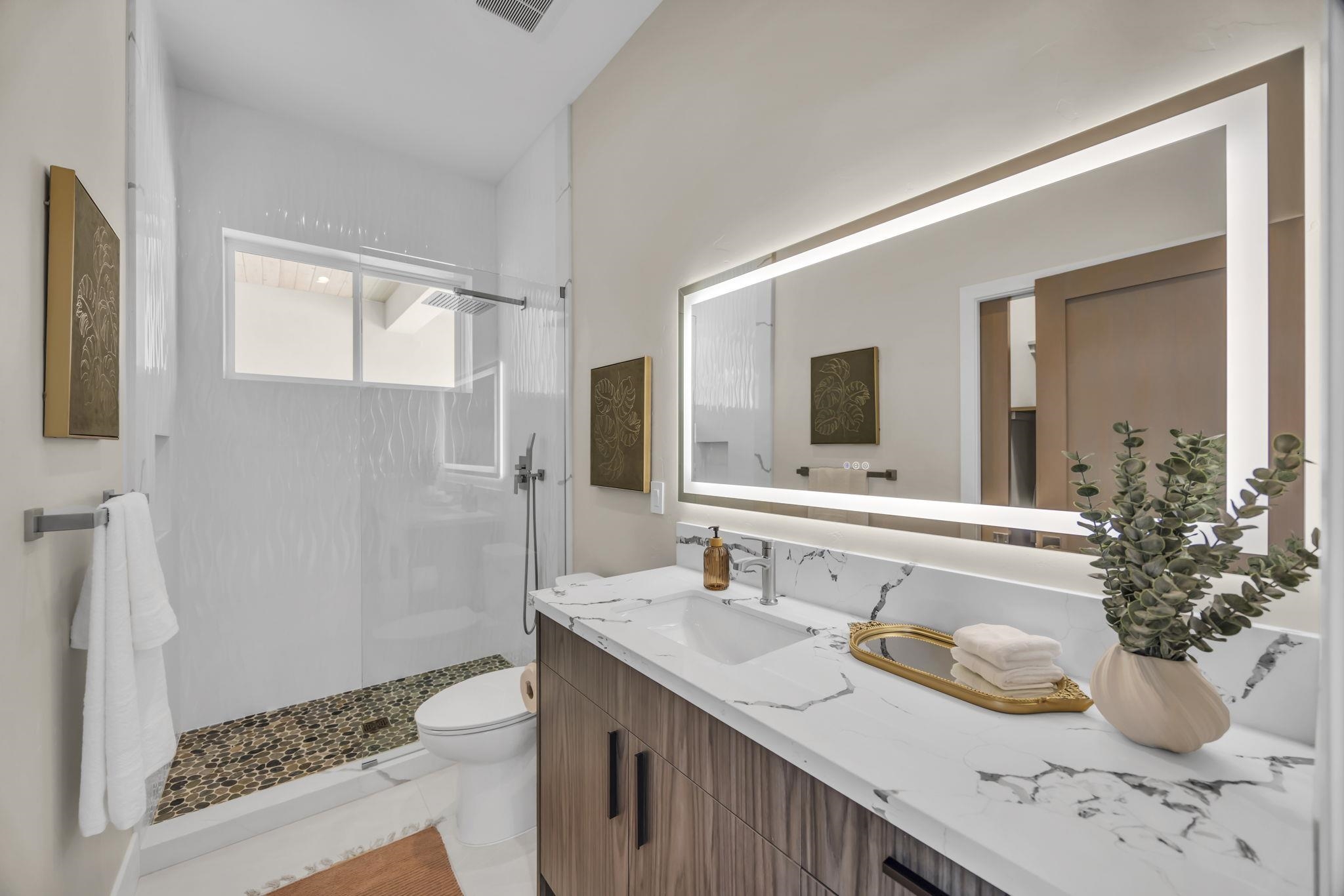 500 Kai Huki Circle, Unit B Haiku, HI 96708 - Photo 26 of 50 a bathroom with a sink and a mirror