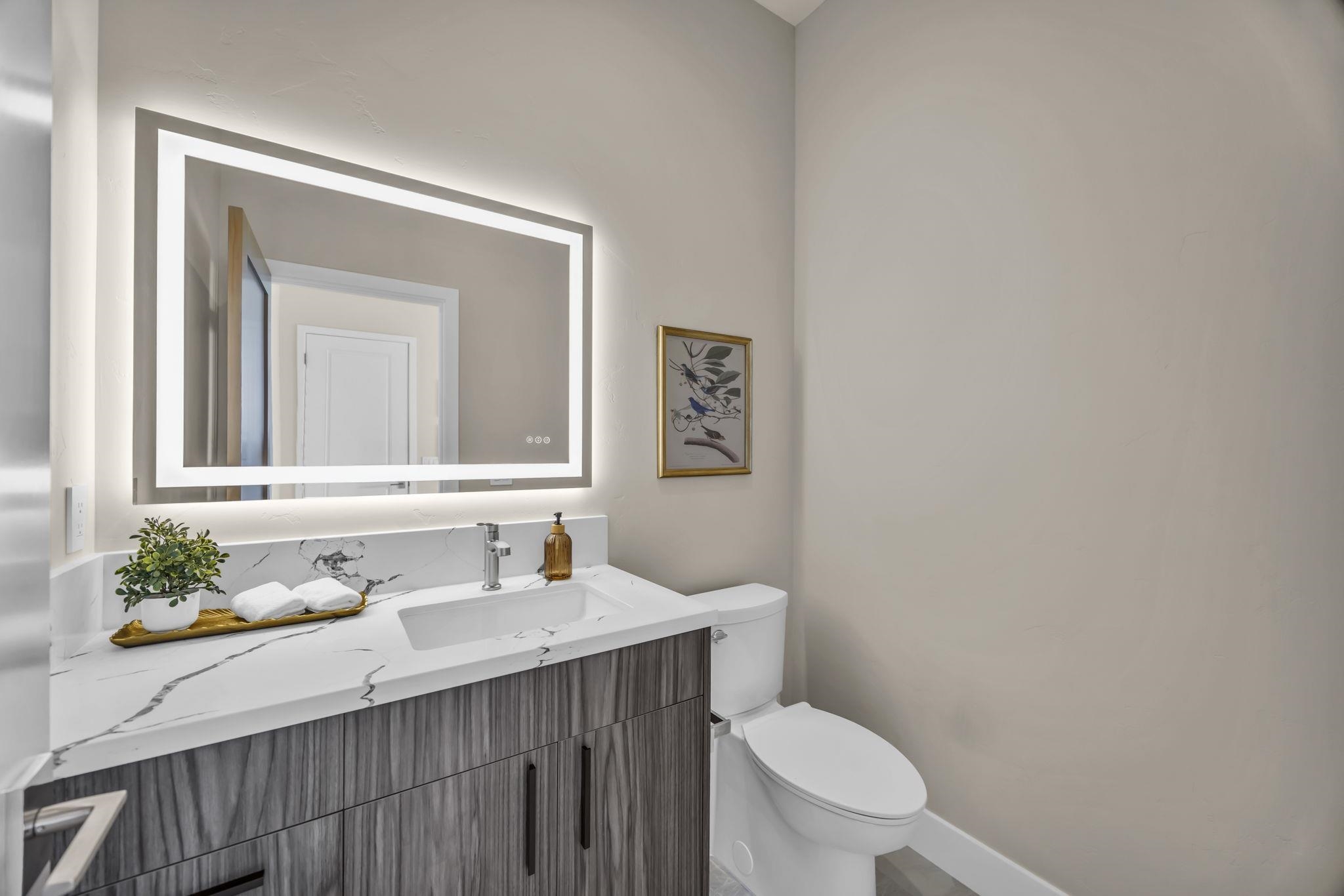 500 Kai Huki Circle, Unit B Haiku, HI 96708 - Photo 31 of 50 a bathroom with a sink a toilet and mirror