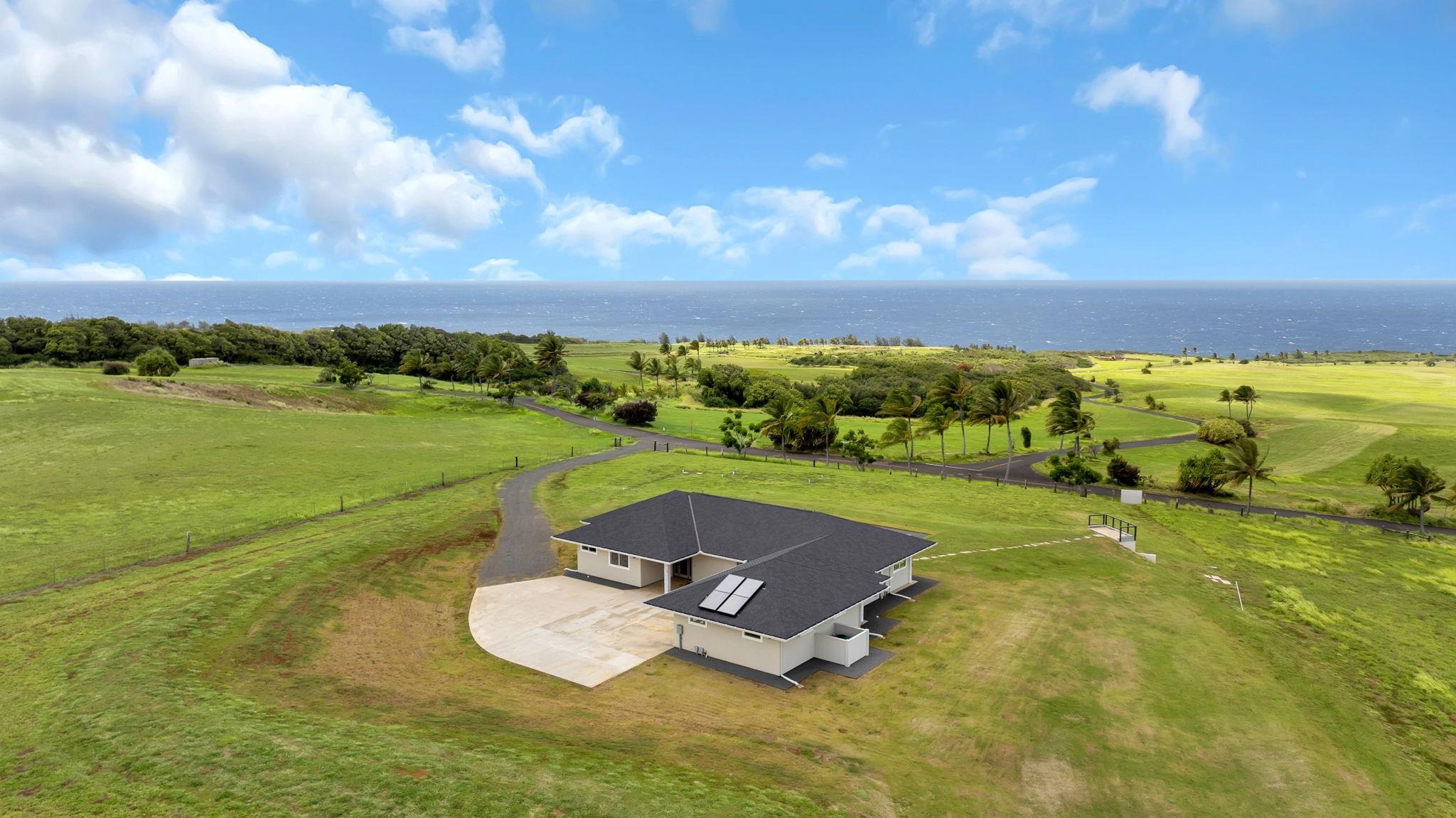 500 Kai Huki Circle, Unit B Haiku, HI 96708 - Photo 38 of 50 a view of a swimming pool with an outdoor space and seating area