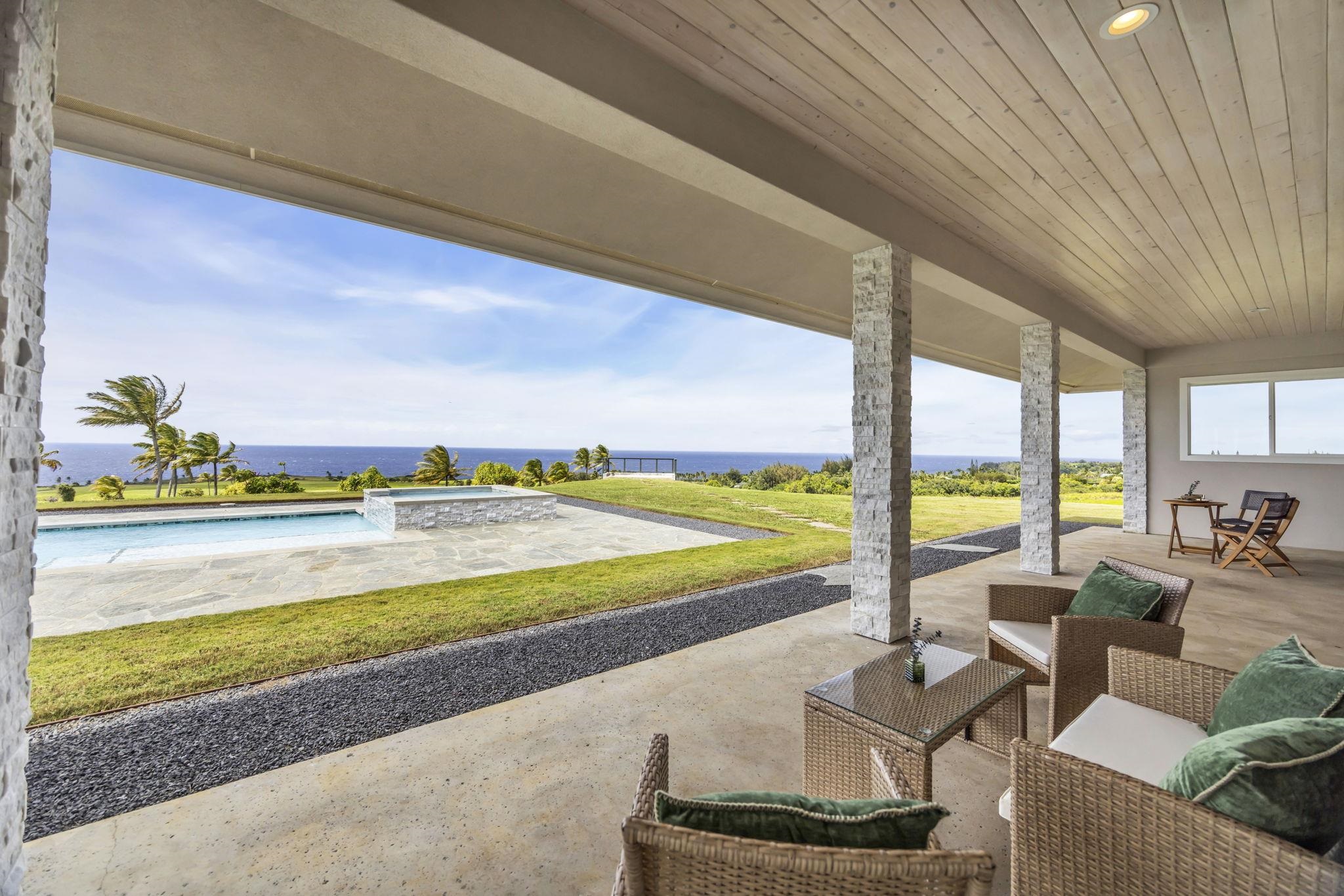 500 Kai Huki Circle, Unit B Haiku, HI 96708 - Photo 46 of 50 a view of swimming pool with outdoor seating and a yard