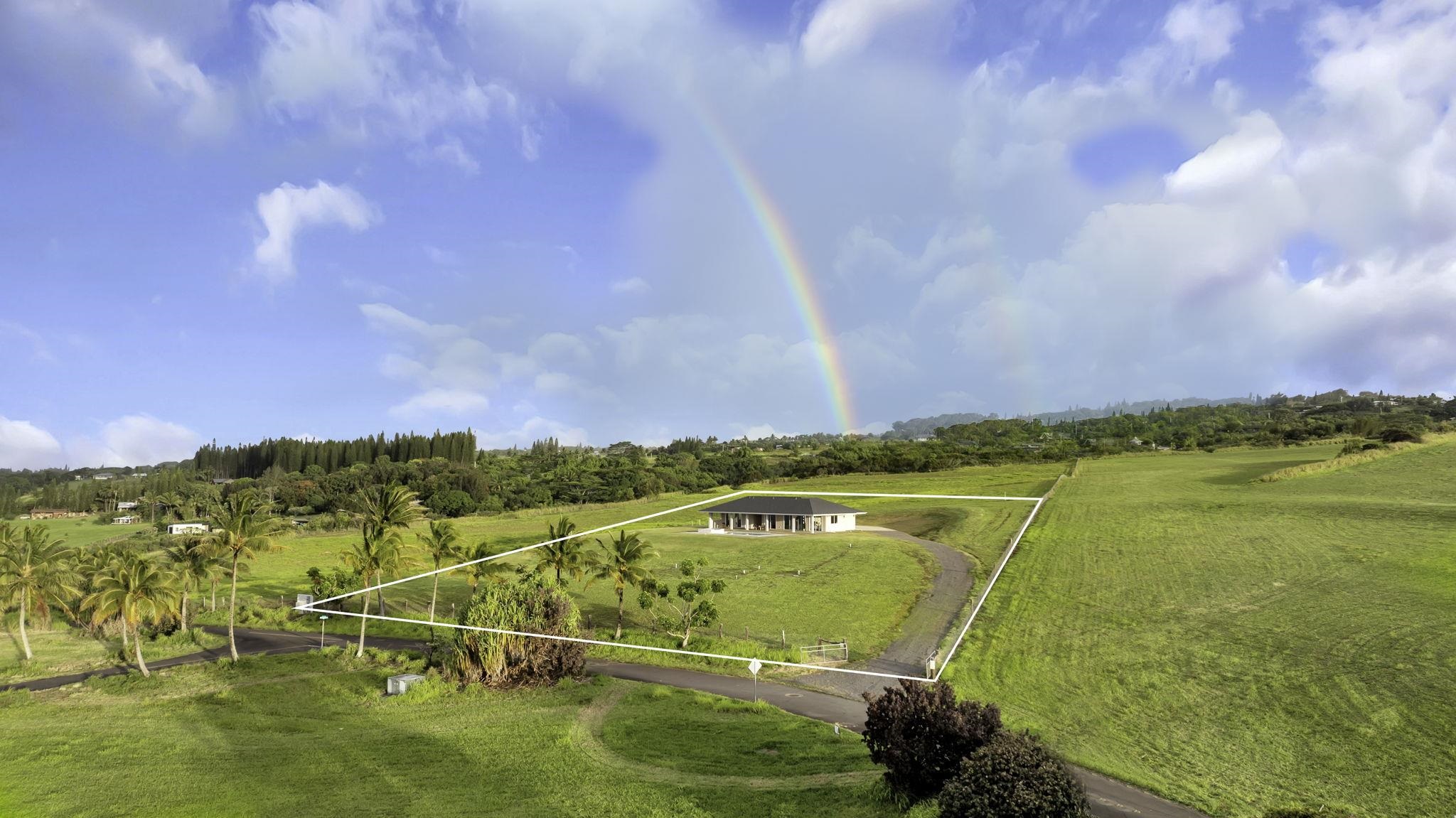 500 Kai Huki Circle, Unit B Haiku, HI 96708 - Photo 49 of 50 a view of a swimming pool with a lake view