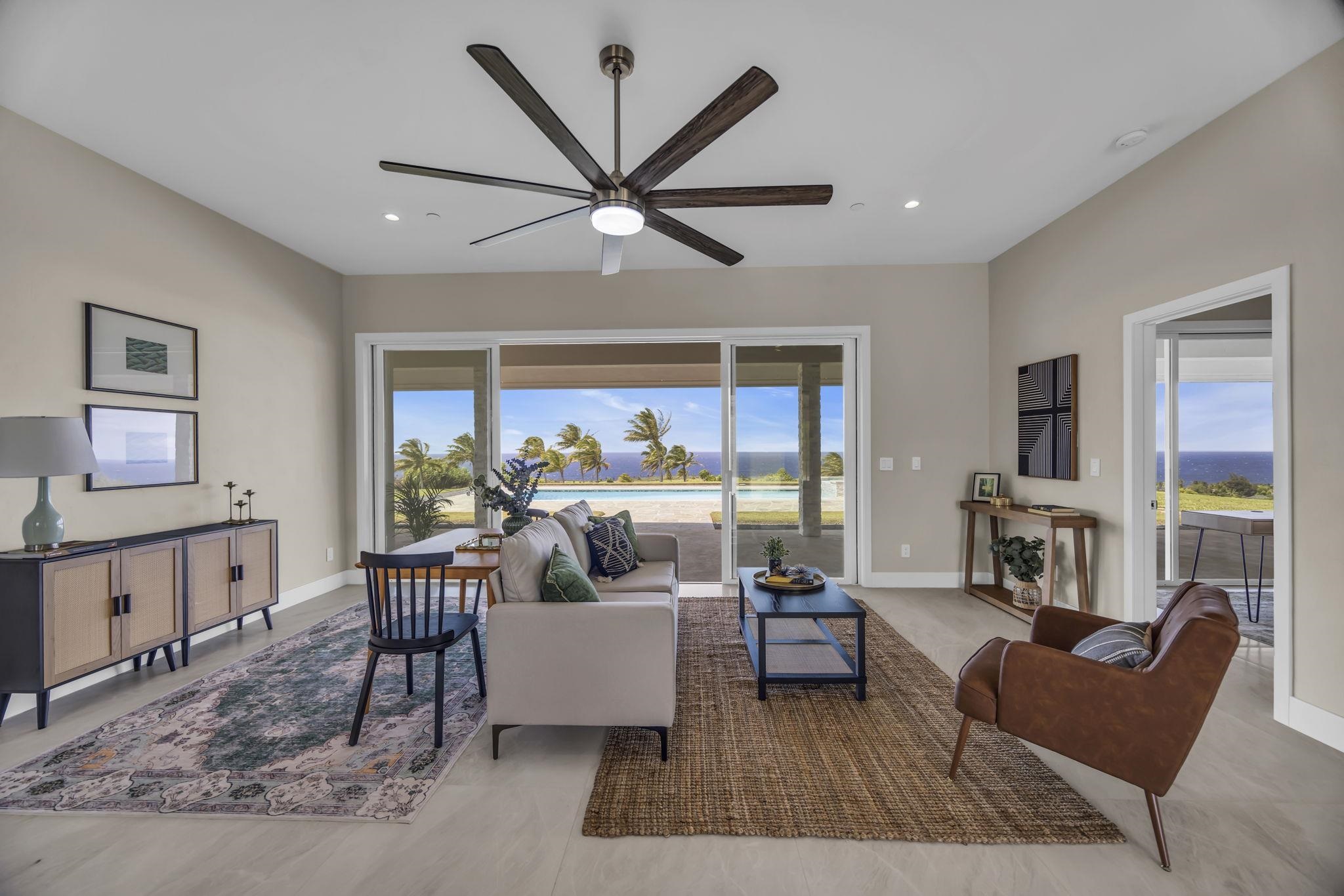 500 Kai Huki Circle, Unit B Haiku, HI 96708 - Photo 10 of 50 a living room with furniture and a large window