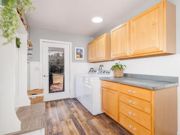 a kitchen with sink cabinets and window