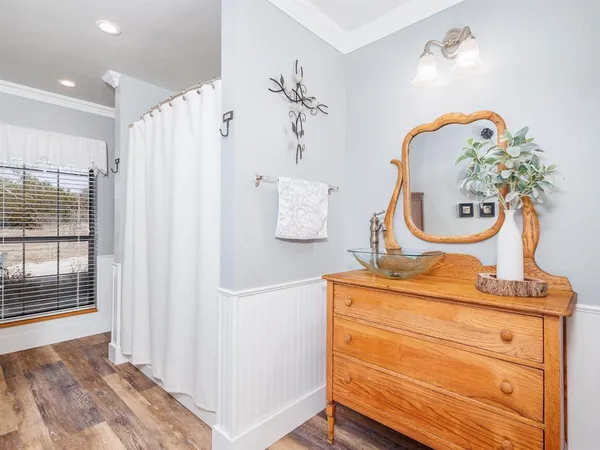 a room with a mirror and a table