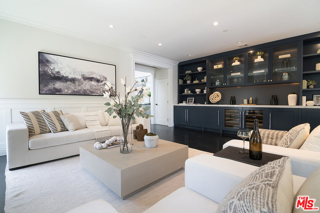2737 Angus Street Los Angeles, CA 90039 - Photo 11 of 56 a living room with furniture and a floor to ceiling window