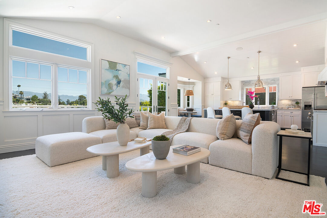2737 Angus Street Los Angeles, CA 90039 - Photo 17 of 56 a living room with furniture and a large mirror