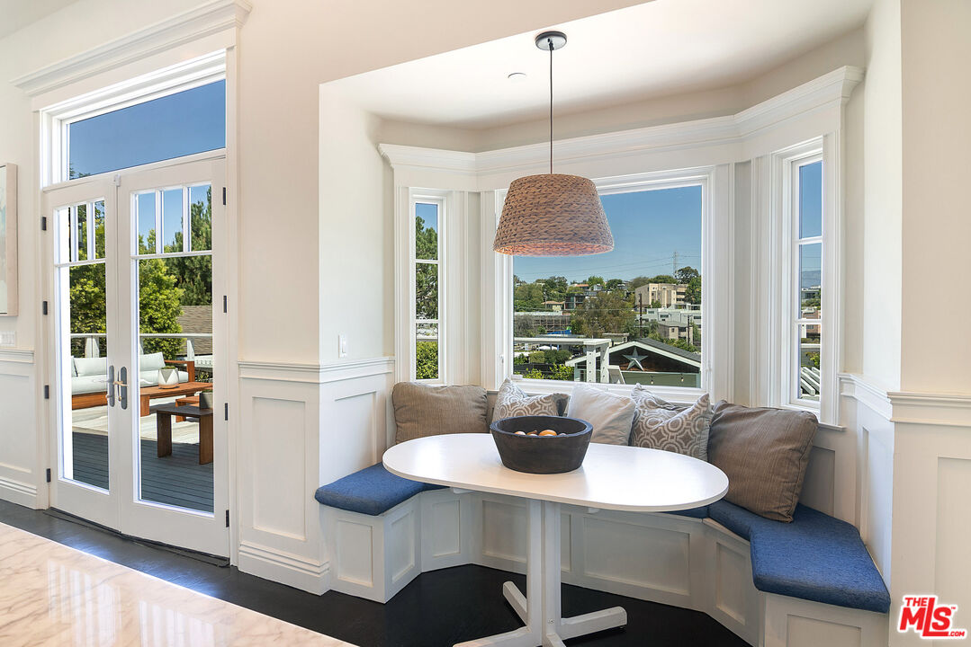 2737 Angus Street Los Angeles, CA 90039 - Photo 23 of 56 a view of a dining room with furniture window and outside view